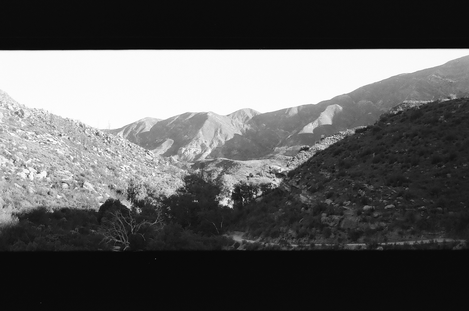 in the mountains at sunrise, bw