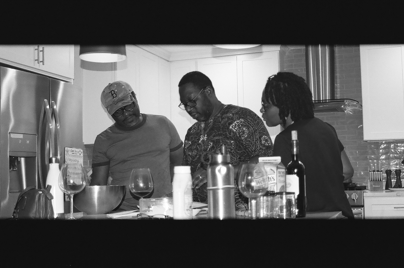 gustav, didi, and fortunée planning the christmas meal, bw